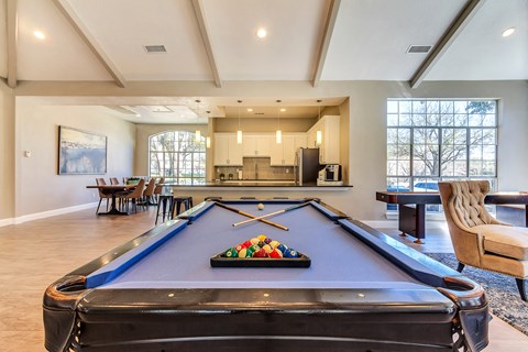 Resident lounge with on-site pool table and full entertainment kitchen for resident use